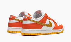 The Women’s Nike Dunk Low “Golden Orange” is a women’s-exclusive version of the retro basketball shoe in a colorway based on an original option from 1985.  The shoe in question is the “Syracuse” Dunk High, a white and orange colorway from the college basketball-inspired “Be True to Your School” collection.  Like the “Syracuse,” the “Golden Orange” features a white leather base with contrasting orange leather overlays.  Unlike the “Syracuse,” the “Golden Orange” dons a Golden Orange-colored leath Wmns Dunk Low, Retro Basketball Shoes, Retro Basketball, Purple Sneakers, School Collection, Orange Shoes, Dunk High, White And Orange, Casual Sneakers Women