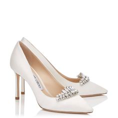 Brand New Jimmy Choo Ivory/Crystal 85 Romy Embellished Pointed-Toe Pump The Classic Romy Heel Gets A Contemporary Update In Chic Ivory Satin. Leather Lined And With A Leather Sole, The 85mm Heel Height Creates A Leg-Lengthening Effect. Take Centre Stage At Your Next Party In These Head Turning Heels. Satin With Crystal Embellishment Stiletto Heel Leather Lined Leather Sole Heel Height Measures: 85mm/3.3 Inches Made In Italy This Product Uses Responsible Satin A Mix Of 28% Organic Silk And 72% Ce Jimmy Choo Wedding Heels, Jimmy Choo Wedding Shoes, Fancy Footwear, Half Shoes, Heels Aesthetic, White Weddings, Basic Shoes, Ladies Footwear, Dr Shoes