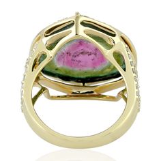 Modern style gemstone jewelry. This ring is made of gold and gemstone diamond material and are capable of reflecting some light to produce a natural glow, which is a unique feature found only in premium jewelry. Info- These Ring are handmade in 18k Yellow Gold : 7. 116 grams and Diamond: 0. 64 cts , Melon Tourmaline  : 9. 47 cts (ING-8994)  Care- This jewelry is made by hand featuring detailed workmanship. Be careful to avoid dropping or banging as physical impacts can result in damage to the pieces including stones falling off. To care for your or jewelry, take caution to keep away from harsh chemicals, Perfume, and Water. You may wipe with a clean polishing cloth to maintain a beautiful shine. Keep in mind that extensive exposure to saltwater, sunlight or harsh chemicals can permanently Luxury Tourmaline Rings, Fine Jewelry Polished Diamond Gemstones, Fine Jewelry Diamond Gemstones With Polished Finish, Luxury Tourmaline Gemstones With Accent Stones, Luxury Tourmaline Gemstones With Gemstone Accents, Luxury Tourmaline Jewelry With Prong Setting, Luxury Diamond Rings With Gemstone Accents, Luxury Tourmaline Jewelry For Formal Occasions, Luxury Gold Tourmaline Rings