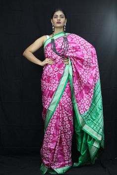 Exclusive hand-woven Sambalpuri silk saree with Pasapali Finest pure handwoven sambalpuri ikat silk saree with traditional motifs woven by the master weavers of Sambalpur, Odisha. It has lovely patterns and is world-famous for its stunning colours, texture and designs. Occasion: Party Wear Fabric: Sambalpuri Primary Color: Pink Secondary Color: Green Material: Mulberry Silk/ Sambalpuri Silk Pattern: Motif Border Type: Ikkat Border Size: Medium Blouse Piece: Included Care: Dry Clean Disclaimer : This is a genuine handwoven piece, unevenness in the selvedge and weave could be expected and colours may fade or bleed due to the traditional dyeing method employed. Navratri Silk Traditional Wear With Ikat Print, Navratri Ikat Print Silk Traditional Wear, Diwali Ikat Print Art Silk Traditional Wear, Navratri Traditional Chanderi Wear With Ikat Print, Ikat Print Art Silk Traditional Wear, Silk Ikat Print Traditional Wear For Diwali, Art Silk Traditional Wear With Ikat Print, Ikat Print Silk Traditional Wear For Diwali, Diwali Ikat Print Silk Traditional Wear