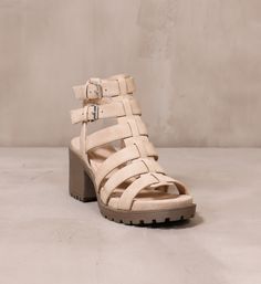 Shoes for the young at heart. Let these chunky platform sandals by Dirty Laundry show off your style with their lug sole, strappy cage upper, and open toe silhouette. Pair with a denim skirt and a graphic tee for an effortless look. Manmade Materials l 3" Heel l Runs Big, We Suggest To Size Down Half Size Casual Sandals With Chunky Platform And Block Heel, Spring Chunky Platform Sandals, Casual Chunky Platform Sandals For Spring, Summer Sandals With Lug Sole And Block Heel, Open Toe Heels With Lug Sole For Spring, Spring Open Toe Heels With Lug Sole, Casual Strappy Heels With Buckle Closure, Trendy Spring Chunky Platform Heels, Chic Summer Sandals With Lug Sole