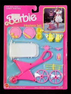 a barbie doll's accessories set is shown in the package, including a pink stroller