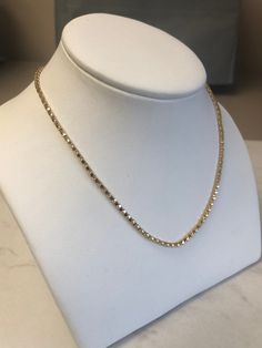 "A Beautiful 18kt Yellow Gold Lady's Open Box Chain in 24\" length. This Chain is strong and has a bright shiny plain polished finish for a sparkling look. This Chain is 2mm thick and weighs 8 grams. This item would Retail for $1,560.00" Formal 14k Yellow Gold Tennis Necklace, Luxury 14k Yellow Gold Tennis Necklace, Dazzling Diamond Cut Yellow Gold Tennis Necklace, 14k Yellow Gold Tennis Necklace Gift, Dazzling Yellow Gold Diamond Cut Tennis Necklace, Round Tennis Necklace With Box Chain For Anniversary, 14k Gold Silver Diamond Cut Tennis Necklace, Dazzling Gold Chain Necklace Gift, Box Chain Tennis Necklace For Anniversary