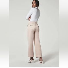 Questions? Leave A Comment Below! Mid-rise Beige Wide Leg Pants For Spring, Spring Mid-rise Beige Wide Leg Pants, Beige Mid-rise Wide Leg Pants For Work, Chic Beige Mid-rise Wide Leg Pants, Chic Beige Wide Leg Mid-rise Pants, Feminine Beige Wide Leg Bottoms, Mid-rise Dress Pants With Pockets, Feminine High-waisted Workwear Bottoms, Feminine Straight Leg Workwear Pants