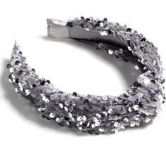 Complete your look this holiday season with Shiraleah's Knotted Sequins Headband. This headband will add a chic and elevated touch to your outfit. This one-size headband features a sequins, lustrous fabric making it chic yet versatile. Made from polyester and adorned with a knotted detail, this Shiraleah headband will keep your hair at bay while amplifying your style. Glamorous Silver Headband For Party, Silver Glamorous Party Headband, Glamorous Silver Party Headband, Adjustable Silver Glamorous Headband, Glamorous Adjustable Hair Accessories For Parties, Trendy Party Headband, Glamorous Party Headband, Silver Headband For Evening Wear, Silver Headband For Party