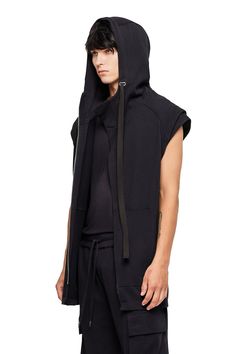 Luxe and insanely soft, our Sleeveless Long Hoodie has a tailored, athletic fit with defined ribbing at the hem and armor shoulder detail. — Cotton spandex rib hem— Oversized hood— 100% heavy jersey cotton SIZE + FIT— Athletic sweatshirt fit— Longline hem— Fits true to size— Model is 6'1 and is wearing a size L CARE— Hand wash cold, lay flat to dry Armor Shoulder, Crowned Crane, Athletic Sweatshirts, Hooded Vest, Sleeveless Hoodie, Athletic Fits, Long Hoodie, Long A Line, Cotton Spandex