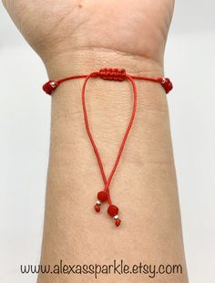 The post is for one individual bracelet. This beautifully handmade bracelet is made of 4mm red rondelle crystal beads, small silver colored beads, with a turkish glass eye bead that is 6mm. They are made with red nylon string and are adjustable to fit most wrists as it has a sliding knot to adjust. These are a great accessory for everyday wear. This bracelet is great for spiritual and evil eye purposes. It is believed that when a person wears or carries an evil eye with them, it guards against m Red Spiritual Crystal Bracelet With Round Beads, Spiritual Red Crystal Bracelet With 8mm Beads, Adjustable Silver Beads Rosary Bracelet, Adjustable Rondelle Crystal Bracelet With 8mm Beads, Flexible Friendship Bracelets With Round Beads As Gift, Adjustable Red Sterling Silver Beaded Bracelets, Red Adjustable Sterling Silver Beaded Bracelets, Red Sterling Silver Beaded Bracelets, Adjustable Spiritual Silver Beaded Bracelets