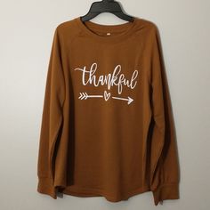 *New With Out Tags, No Wear/Tear *Medium And Large Sizes Available *Medium: 25in Length, 20 Pit-To-Pit *Large: 26in Length, 22 Pit-To-Pit *Feels Soft And Cozy *Great For Fall/Thanksgiving Everyday Brown Letter Print Tops, Brown Letter Print T-shirt For Fall, Tan Crew Neck T-shirt For Fall, Cricut Thanksgiving Shirts, Fall Cricut Shirts, Thanksgiving Sweatshirt, Cricut Projects Vinyl, Thanksgiving Shirts, Fall Shirts