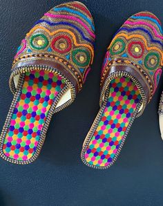 Size 7 Multicolor Leather Open Toe Mules, Summer Multicolor Flat Heel Mules, Brown Bohemian Flat Heel Sandals, Brown Bohemian Flat Sandals, Multicolor Flats With Rubber Sole, Flat Fabric Sandals For Vacation, Textile Closed Toe Sandals For Vacation, Bohemian Embroidered Flats For Festivals, Closed Toe Textile Sandals For Vacation