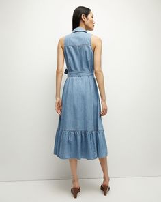 Made from 100% cotton denim, this lightweight shirtdress features a neat collar and a feminine flounced hem. Finished with a patch pocket and a waist-defining tie belt, it pairs well with sandals in the summer and boots as the weather cools down.100% CottonUnlinedTurn inside out and machine wash cold. Hang to dry.Style #J24067101287IC Belted Denim Dress For Summer Workwear, Belted Cotton Denim Dress For Summer, Plus And Minus, Denim Shirt Dress, Sweaters And Jeans, Veronica Beard, Midi Dress Sleeveless, Shirtdress, Top Sales