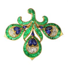 "Holding this late Victorian French brooch, one is immediately struck by the impeccable craftsmanship and the exquisite quality of the stones. The precision-cut intense green emeralds, along with the uniquely shaped sapphires and colourless diamonds, manifest a remarkable standard of artistry. This piece is more than just jewellery; it's a tangible connection to a bygone era, igniting a profound \"must-have\" emotion, especially resonant with collectors of antique jewels. The brooch's intricate design and vibrant colours not only capture the eye but also the heart, embodying a timeless allure that transcends mere aesthetic appeal. Antique jewelry object group Fleur-de-Lis Splendour: Antique French Brooch with Intense Green Essence Condition very good condition more info on our condition sc Aesthetic Movement, Victorian Design, Colorless Diamond, Arts And Crafts Movement, Victorian Era, Brilliant Cut Diamond, French Antiques, Antique Jewelry, Anniversary Gifts