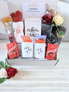 a valentine's day gift box filled with coffee, chocolates and candy bars