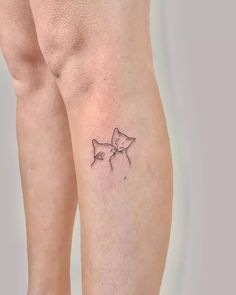 Amazing Cat Tattoo Ideas And Meaning Cat Small Tattoo Ideas, Tasteful Cat Tattoos, Cat Tattoo On Leg, Cat Inspired Tattoos Minimalist, Two Cats Tattoo Ideas, Simple Kitty Tattoo, Small Dainty Cat Tattoos, Two Cats Tattoo Outline, Cat Tattoo 2 Cats