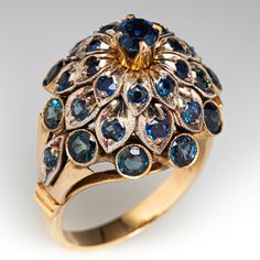 This vintage silver topped, 10K yellow gold Thai princess style ring features thirty-three (33) round cut sapphires in bead and bezel settings with milgrain edging. The ring measures 18.3mm at the top, rises 14.1mm above the finger, tapering to 2.6mm wide and 1.2mm thick at the base of the shank. The ring is currently a size 7. Vintage Rings Aesthetic, Vintage Rings Antiques, Poseidon Aesthetic, Princess Rings, Black Opal Engagement Ring, Thick Gold Ring, Sapphire Antique Ring, Jade Jagger, Ornate Jewelry