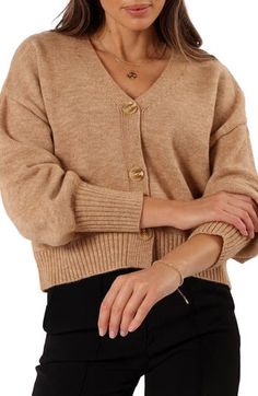 A relaxed, slightly cropped silhouette adds to the laid-back charm of this casual V-neck cardigan trimmed by soft ribbing. Front button closure V-neck Long sleeves Ribbed cuffs and hem 52% acrylic, 28% nylon, 20% polyester Hand wash, dry flat Imported Trendy V-neck Everyday Cardigan, Trendy V-neck Cardigan For Everyday, Beige V-neck Cropped Sweater For Fall, Fall Beige V-neck Cropped Sweater, Fall V-neck Sweater For Everyday Wear, Everyday Fall V-neck Sweater, Jackets Jeans, Stripes Texture, Bold Stripes