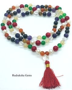 Welcome, Namaste --------- Description PLANETARY NAV RATNA JAPA MALA SIZE OF BEADS : 7 MM NUMBER OF BEADS : 108 +1 ( + ROCK CRYSTAL SPACER bead after 54 bead for Planetary perfect formation) LENGTH OF MALA :86CM APPROX MADE WITH TRADITIONAL STYLE WITH KNOTS AFTER EACH BEADS PREMIUM QUALITY This rare mala consists of 9 semi-precious stones, each one representing a planet of the solar system. Stones include carnelian (Sun), pearl (Moon), coral (Mars), aventurine (Mercury), citrine (Jupiter), quart Adjustable Multicolor Crystal Necklace With 8mm Beads, Multicolor Polished Beaded Bracelets For Meditation, Multicolor Polished Beads Bracelet For Meditation, Multicolor Crystal Necklaces With 8mm Round Beads, Multicolor Round Spiritual Beaded Necklaces, Spiritual Crystal Necklaces With Colorful Round Beads, Spiritual Multicolor Round Beads Crystal Necklace, Spiritual Multicolor Round Beaded Necklaces, Spiritual Polished Round Beads Crystal Necklaces