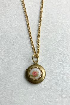 SMALL Antique Brass LOCKET With Vintage Glass Limoge - Etsy Antique Gold Jewelry With Rose Design, Vintage Rose Design Pendant Jewelry, Vintage Rose Design Necklace For Gift, Vintage Brass Nickel-free Locket Necklace, Vintage Brass Locket Necklace Nickel-free, Vintage Brass Locket Necklace Nickel Free, Vintage Nickel-free Brass Locket Necklace, Vintage Brass Locket Necklace, Victorian Gold Jewelry With Rose Design