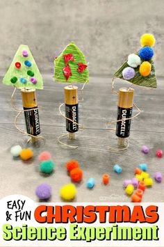 christmas science experiment for kids using batteries and pom poms