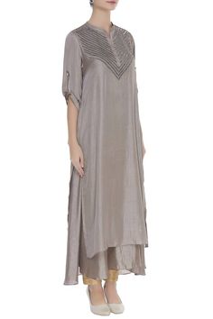 Bring out the style icon in you by wearing this embellished yoke layered tunic.
Embellished yoke
Layered silhouette
Mandarin neckline and short sleeves
Regular fit - Aza Fashions Mandarin Neckline, Layered Tunic, Tunics Online, Gray Silk, Embroidered Silk, Style Icon, Aza Fashion, Short Sleeves, Silk