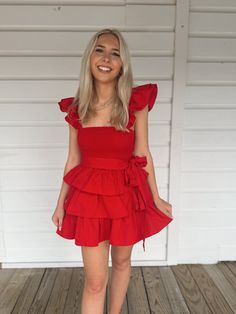 Adorable red ruffle tiered romper with a detachable waist tie and ruffle straps. Model is 5'4" with a 25" waist, 32" bust, and 32" hips wearing a small. Barbie Collection, New Arrival Dress, Holiday Collection, Waist Tie, Shoe Collection, Red Dress, Cute Outfits, Rompers, Red