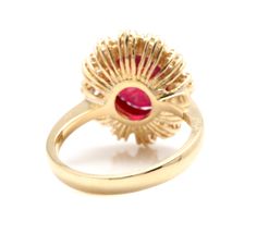 7.20 Carats Impressive Natural Red Ruby and Diamond 18K Yellow Gold Ring Suggested Replacement Value: $5,400.00 Total Red Ruby Weight is: Apprx. 6.00 Carats (Lead Glass Filled) Ruby Measures: Approx. 11.00 x 9.00mm Natural Round Diamonds Weight: Approx. 1.20 Carats (color G-H / Clarity SI1-2) Ring total weight: Approx. 5.9 grams Disclaimer: all weights, measurements and colors are approximate and may vary slightly from the listed dimensions or as seen in the image. All pictures are magnified to Luxury Red Diamond Ring With Polished Finish, Formal Red Diamond Ring With Polished Finish, Exquisite Red Diamond Ring For Formal Occasions, Luxury Red Ruby Cluster Ring, Luxury Red Ruby Ring Hallmarked, Luxury Red Cluster Ring With Center Stone, Formal Red Diamond Cluster Ring, Red Diamond Cluster Ring For Formal Occasions, Red Hallmarked Cluster Ring In Fine Jewelry Style