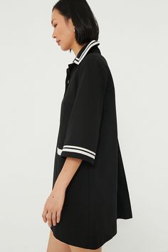 The Jet Black Hart Shirt Dress is making all of our dreams come true. With dramatic bell sleeves and contrast trim, this mini is begging to be taken on a weekend adventure. Little details include a three-button front placket to add a polished touch and a perfectly comfortable swingy fit. From strolling the boardwalk to grabbing a drink at happy hour, we are pairing this effortlessly cool frock with everything from fresh white sneakers to flats to heels. Oversized collar Elbow length bell sleeves Jet Black, Contrast Trim, White Sneakers, Bell Sleeves, Shirt Dress, Black