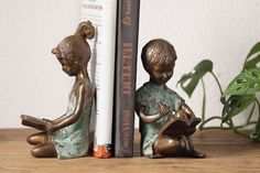 Boy and Girl Bookends Pair Wind Art, Rain Accessories, Handcrafted Decor, Art Desk, Garden Stool, Boy And Girl, Garden Statues, Holiday Collection, Glass Decor