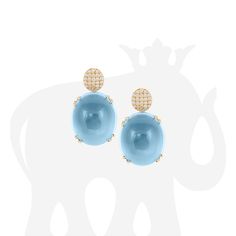 JE0098-BT 'Rock 'N Roll' Blue Topaz Oval Cabochon with Diamonds Motif Earrings in 18K Gold Stone size: 20 x 17 & 9.5 mm Approx. gemstone Wt: 58.90 Carats Diamonds: G-H / VS, Approx. Wt: 0.49 Carats Cabochon Earrings Studs, Luxury Traditional Jewelry With Oval Cabochon, Luxury Oval Cabochon Gemstones, Luxury Oval Cabochon Gemstone Earrings, Luxury Yellow Gold Oval Cabochon Gemstones, Luxury Diamond Cabochon Earrings, Luxury Diamond Earrings With Cabochon, Luxury Blue Round Cabochons, Luxury Oval Cabochon Diamond Gemstones