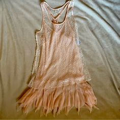 This Blush Pink Mini Sequin Dress Is Perfect For Parties. Comes With A Sheer Tulle Slip And A Shorter Sequin Outer Layer. Has A Razorback And Adjustable Straps For The Slip Inside. The Bottom Is Very Flowy With A Handkerchief Hem. Dress Is Very Sheer. Never Been Worn. Measurement (Dress): Bust: 16.5 In Waist: 16.5 In Length (From Waist To Hem): 18 In Fitted Lace Mesh Summer Dress, Fitted Lace Mesh Dress For Summer, Fitted Mini Flapper Dress For Summer, Fitted Mini Length Flapper Dress For Summer, Bohemian Stretch Mini Dress For Party, Flirty Sleeveless Sheer Mesh Dress, Flirty Stretch Mesh Summer Dress, Flirty Stretch Mesh Dress For Summer, Fitted Sleeveless Flapper Dress For Summer