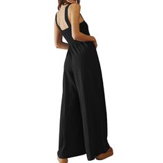 Black Sleeveless Oversized Wide Leg Jumpsuit Sleeveless Jumpsuits And Rompers For Leisure, Black Versatile Jumpsuits And Rompers For Summer, Versatile Black Jumpsuits And Rompers For Summer, Black Jumpsuits And Rompers For Summer Leisure, Sleeveless Beach Jumpsuits And Rompers, Summer Strapless Sleeveless Jumpsuit For Loungewear, Chic Black Strapless Jumpsuit For Beach, Black Solid Color Jumpsuits And Rompers For Loungewear, Black Loungewear Jumpsuits And Rompers