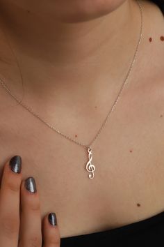 This cute 925 sterling silver necklace is a must for every woman. Can be worn alone, or layered with other necklaces for a trendier look. This silver animal necklace comes in a beautiful box, gift-ready!  ❤️ It would be an amazing gift for Anniversary, Birthdays, Christmas, Mother's Day, Women's Day. FEATURES - Material: High Quality Solid 925 Sterling Silver - Pendant height: 2.2 cm - Pendant width: 0.7 cm - Color Options: Silver, Yellow Gold, Rose Gold - Chain length 16 inches, 18 inches or 20 inches ❤️Production Techniques: Handmade and Laser Cutting (for High Quality) PACKING ❤️ All products are ready to be sent to you in stylish gift boxes. Also, there is no need for gift wrapping. SHIPPING AND RETURN - Production is made according to the order and delivered to the cargo next day. - S Nickel-free Silver Music-themed Necklaces, Music-themed Silver Pendant Necklace, Nickel-free Sterling Silver Music-themed Necklace, Silver Music-themed Necklace For Gift, Sterling Silver Music-themed Pendant Necklace, Music-themed Sterling Silver Pendant Necklace, Music-themed Sterling Silver Necklace, Silver Sterling Music-themed Necklace, Music Pendant