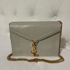 Like New Saint Laurent White Cassandra Croc-Embossed Leather Cross-Body Bag With Ghw. Can Be Shoulder Or Crossbody For Styling. Got It Long Time And Never Used It. Original Price Is $2225. Message Me If Interested. Ysl Crocodile Bag White, Cassandra Bag Saint Laurent, Ysl Cassandra Bag White, Ysl Cassandra, It Original, Yves Saint Laurent Bags, Branded Gifts, Leather Cross, Chain Bag