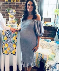 The ultimate baby shower dress for a trendsetting #momtobe. Features a luxurious smocked body, lantern-style sleeves (worn on or off-the-shoulder), bodycon fit, and below-the-knee-length with ruffle details. Available in colors Light Blue and Mauve. Maternity & Postpartum wear 100% Polyester Fully Lined Size Chart. For a bodycon fit, size down, for a loose fit, size up. Questions? Need two sizes? Chat with a stylist using the chat icon! Blue Off-shoulder Dress With Gathered Sleeves, Fitted Smocked Dress With Smocked Bodice For Party, Elegant Fitted Smocked Dress With Puff Sleeves, Elegant Ruched Smocked Dress For Brunch, Fitted Ruched Smocked Dress For Party, Chic Party Dress With Smocked Back, Chic Fitted Smocked Dress For Party, Fitted Smocked Dress With Puff Sleeves For Brunch, Elegant Fitted Smocked Dress With Elastic Sleeves