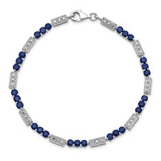 Indulge in elegance and sophistication with our exquisite Silver Polished Sapphire Round Diamond Bracelet. Crafted from high-quality sterling silver, this bracelet features a polished finish and is rhodium plated for a luxurious shine. The open back design enhances the brilliance of the 3-mm 3.645 carat sapphires that are expertly set around the bracelet. Adding a touch of sparkle are the 0.02 carat round diamonds that are carefully placed in between the sapphires.This stunning bracelet is secured with a fancy lobster clasp that not only adds an extra element of design but also ensures a secure fit on your wrist. Perfect for special occasions or daily wear, this bracelet will surely elevate any outfit. Whether you're treating yourself or gifting it to a loved one, this Silver Polished Sapp Round Diamond Bracelet, Elements Of Design, Magnetic Bracelet, Sapphire Stone, Back Design, Diamond Stone, Silver Diamonds, Blue Stone, Sterling Silver Bracelets