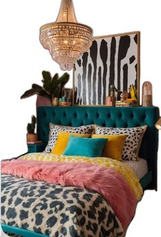 a bedroom with a bed, chandelier and animal print blanket on it's headboard