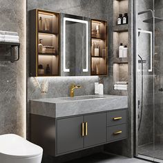 a modern bathroom with marble counter tops and gold accents