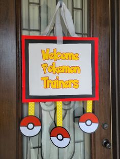 a pokemon themed door hanger that says welcome to the pikachu trainers