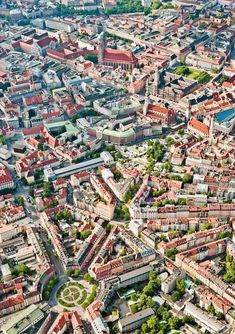 an aerial view of a city with lots of buildings