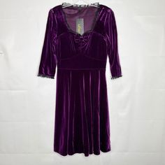 Purple A-line Midi Dress For Fall, Purple Knee-length Winter Dress, Gothic Fitted Purple Dress, Purple Midi Dress For Winter, Purple Winter Evening Mini Dress, Fitted Purple Dress With Lace Trim, Purple V-neck Dress With Lace Trim, Purple Lace Trim Dress For Evening, Gothic Vintage