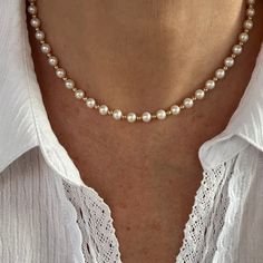 This pearl necklace is handcrafted with AAA+ quality 6mm white round freshwater pearls and small 14k gold filled spacer beads. The pearls have a high luster and iridescence, are perfectly calibrated and are uniform in size. This ultra contemporary modern necklace is simple and attractive, perfect for day or night. The bracelet that matches the necklace is found HERE: https://www.etsy.com/listing/1438218194/round-pearl-and-14k-gold-bracelet-white?click_key=febd606be4d264d89a9d130fc5d305b2021a504f Dainty Round Bead Pearl Necklace, Pearl Necklaces With 8mm Beads For Gifts, Everyday Pearl Necklaces With Round Beads, Pearl Necklace With 8mm Beads For Gifts, Everyday Beaded Pearl White Pearl Necklace, Pearl White Beaded Necklaces With Pearl Charm, Pearl White Beaded Necklace With Pearl Charm, Pearl White Akoya Beaded Necklaces As Gift, 8mm Pearl Necklace As A Gift