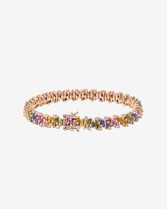 Immerse yourself in the vibrant hues and refined grace of the Shimmer Tennis Bracelet. This exquisite accessory is thoughtfully crafted, featuring 7.5 carats of pastel sapphire baguettes, paired with 1.31 carats of brilliant round diamonds. This bracelet is a celebration of color and sophistication, designed to add a touch of elegance to any ensemble. Details 18k yellow gold or rose gold 7.50 carats of pastel sapphire baguettes 1.31 carats of round white diamonds Bracelet measures 7" inches in l Elegant Multicolor Diamond Bracelet For Formal Occasions, Elegant Multicolor Diamond Bracelet, Elegant Multicolor Tennis Bracelet For Formal Occasions, Multicolor Jubilee Diamond Bracelet For Formal Occasions, Elegant Formal Multicolor Tennis Bracelet, Formal Multicolor Jubilee Diamond Bracelet, Multicolor Diamond Bracelet For Formal Occasions, Multicolor Luxury Diamond Bracelet For Formal Occasions, Luxury Multicolor Diamond Bracelet For Formal Occasions