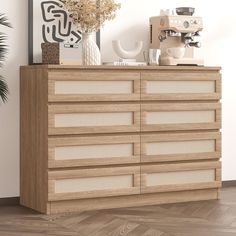 a wooden dresser sitting in front of a wall