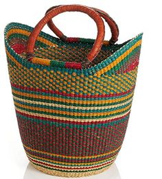 a multicolored woven basket with wooden handles on a white background, isolated for use as a purse or tote bag