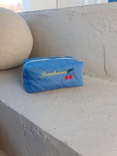 Custom Embroidery Makeup Bag, Quilted Denim Makeup Bag with Personalization, Toiletry Bag with Name, Travel Makeup Bag, Personalized Bridesmaid Gifts. This custom embroidery makeup bag stands out not only for its practicality but also for its exceptional design. Quilted denim makeup bag with personalization is sewn from high-quality blue denim, providing you with both durability and a touch of style to enhance your everyday beauty rituals. It's practical and stylish travel makeup bag - ideal for carrying makeup, pencils, or any must-have you need to go.   This toiletry bag with name It's a practical and memorable gift for bridesmaid or mother's day,  Handcrafted with care and precision, this bag serves as a luxurious home for all your beauty essentials. This toiletry bag with embroidered n Trendy Blue Rectangular Cosmetic Bag, Trendy Blue Rectangular Pouch, Trendy Blue Cosmetic Bag For Travel, Trendy Blue Travel Cosmetic Bag, Blue Zipper Pouch For School, Blue Portable Pouch Cosmetic Bag, Portable Blue Pouch Cosmetic Bag, Blue Embroidered Denim Bags, Blue Embroidered Rectangular Pouch