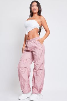 Mauve Stretch Nylon Wide-leg Parachute Pants, Spring Nylon Pink Pants, Pink Nylon Bottoms With Elastic Waistband, Pink Nylon Pants With Pockets, Trendy Parachute Lounge Pants, Pink Stretch Parachute Pants With Elastic Waistband, Trendy High Waist Parachute Pants With Elastic Waistband, Sporty High-waisted Parachute Pants For Spring, High-waisted Nylon Bottoms With Elastic Waistband