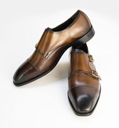 Step into timeless elegance with our Handmade Double Buckle Monkstrap Shoe. Crafted with precision and passion, these shoes are the epitome of craftsmanship and style. Here's a detailed look at what makes these shoes a must-have addition to your collection: Materials: - *Top Grain Leather:* Our shoes are meticulously handcrafted from top-grade leather, ensuring they not only look stunning but also age gracefully over time. - *Leather Sole:* Experience the luxurious comfort and durability of a le Classic Monk Strap Shoes With Removable Insole For Galas, Luxury Monk Strap Shoes With Cap Toe, Luxury Brown Monk Strap Shoes For Formal Occasions, Timeless Monk Strap Shoes For Galas, Luxury Brown Monk Strap Shoes For Business, Luxury Brown Monk Strap Business Shoes, Luxury Brown Business Monk Strap Shoes, Elegant Brown Monk Strap Shoes For Formal Occasions, Elegant Brown Monk Strap Shoes With Goodyear Welted