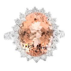 11.10 Carats Exquisite Natural Morganite and Diamond 14K Solid White Gold Ring Suggested Replacement Value: $8,500.00 Total Natural Oval Shaped Morganite Weights: Approx. 10.00 Carats Morganite Measures: Approx. 16.00 x 12.00mm Natural Round Diamonds Weight: 1.10 Carats (color G-H / Clarity SI1-SI2) Ring size: 7 (free re-sizing available) Ring total weight: Approx. 7.5 grams Disclaimer: all weights, measurements and colors are approximate and may vary slightly from the listed dimensions or as se Emerald Cut Aquamarine Ring, Morganite Diamond, Yellow Gold Diamond Ring, Emerald Cut Rings, Etsy Gold Ring, Diamond Cocktail Rings, Domed Ring, White Gold Band, White Gold Ring