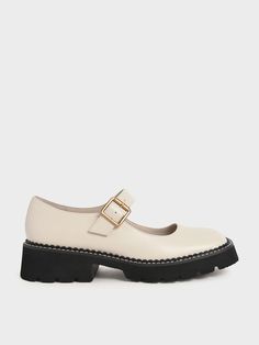 If you have never owned a pair of Mary Janes before, now is the time to treat yourself. Rendered in a chalk-white hue and designed with a buckle strap which can be adjusted, these classic yet trendy shoes are easy to put on and keep on all day. Bonus points for the contrasting black sole that makes them irresistible. Pair them with a crisp white shirt and a pleated skirt for a classy finish and complete your look with a boxy bag. Everyday Loafers, Affordable Clothing Brands, Patent Mary Janes, Charles And Keith, Kawaii Clothes Goth, Boxy Bags, Thick Heel Shoes, Kids Belt, Faux Leather Heels