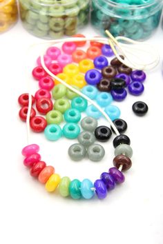 the beads are colorful and ready to be made into bracelets or necklace making kits