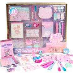 the hello kitty stationery set is packed in a box with its contents and accessories